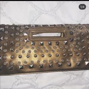 Bronze studded clutch